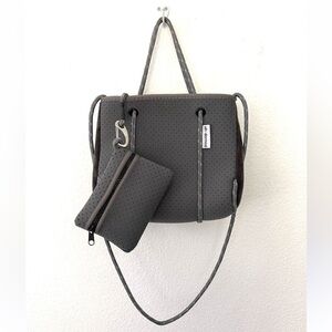 Ahdorned crossbody gray bag. Excellent condition. Includes cute purse inside.
